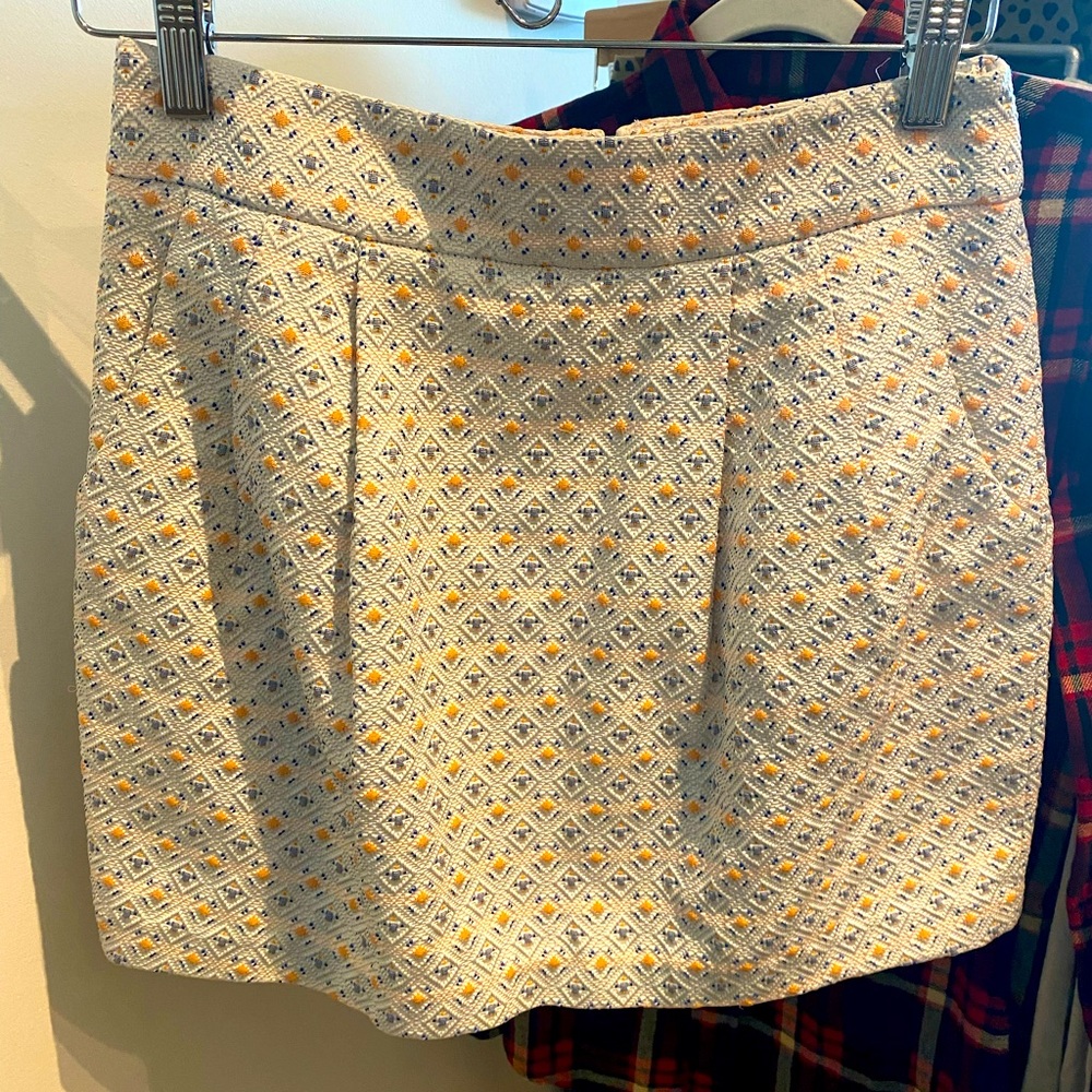 Woven bubble mini skirt with blue and orange pattern